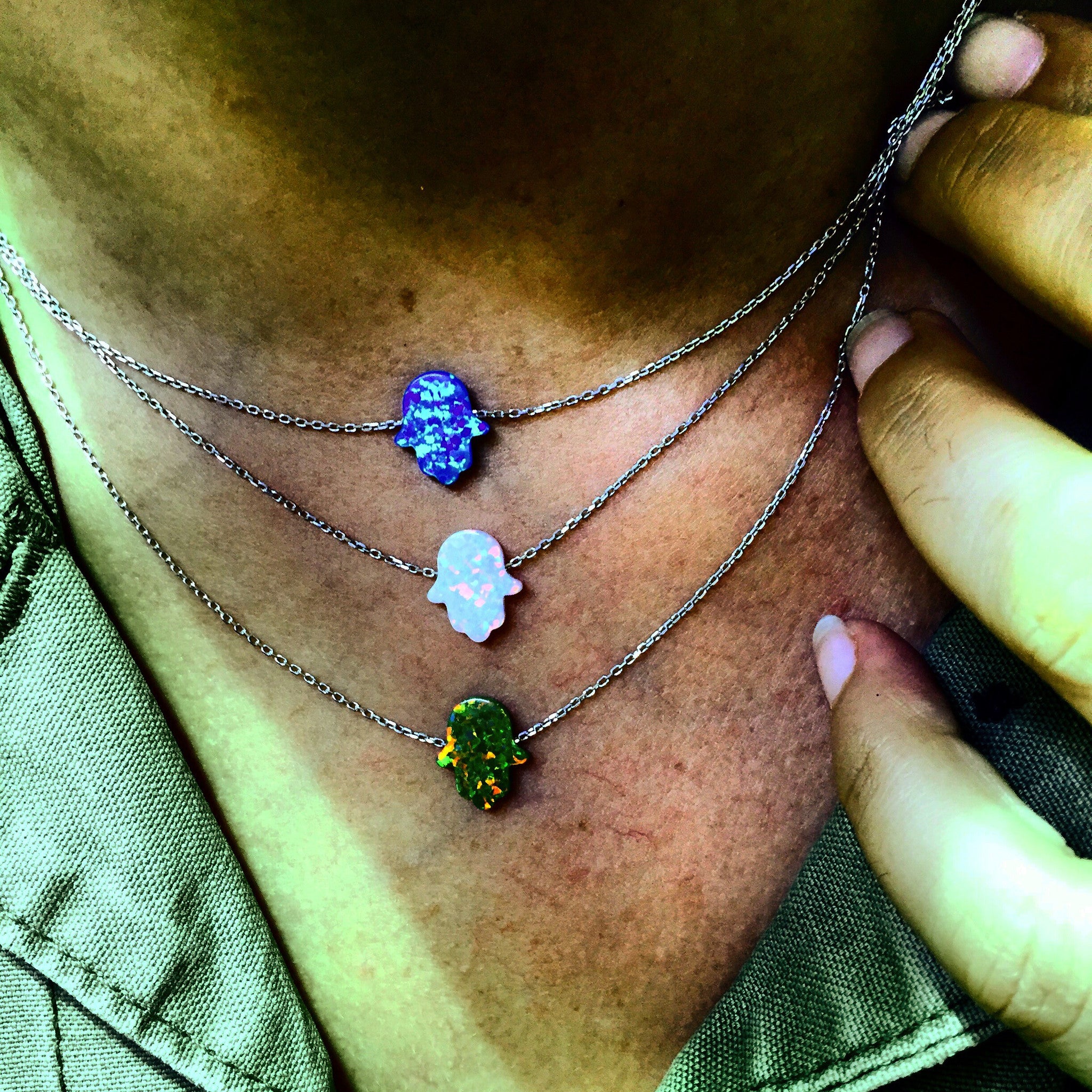 Opaline hand pendant on silver necklace, made with love by displaced women in Syria
