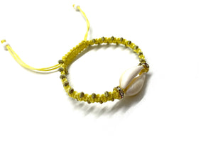 Natural shell yellow cord with gold resin beads