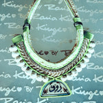 Ishani necklace, made with ishani, a caligraphy hand painted enamel porcelain trafitionaly made in Damascus. Made with love by displaced women in Syria.