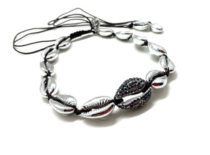 Silver shell necklace, with hematite Swarovski studded central shell and black cord