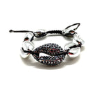 Silver shell bracelet, with hematite Swarovski studded central shell, and black cord