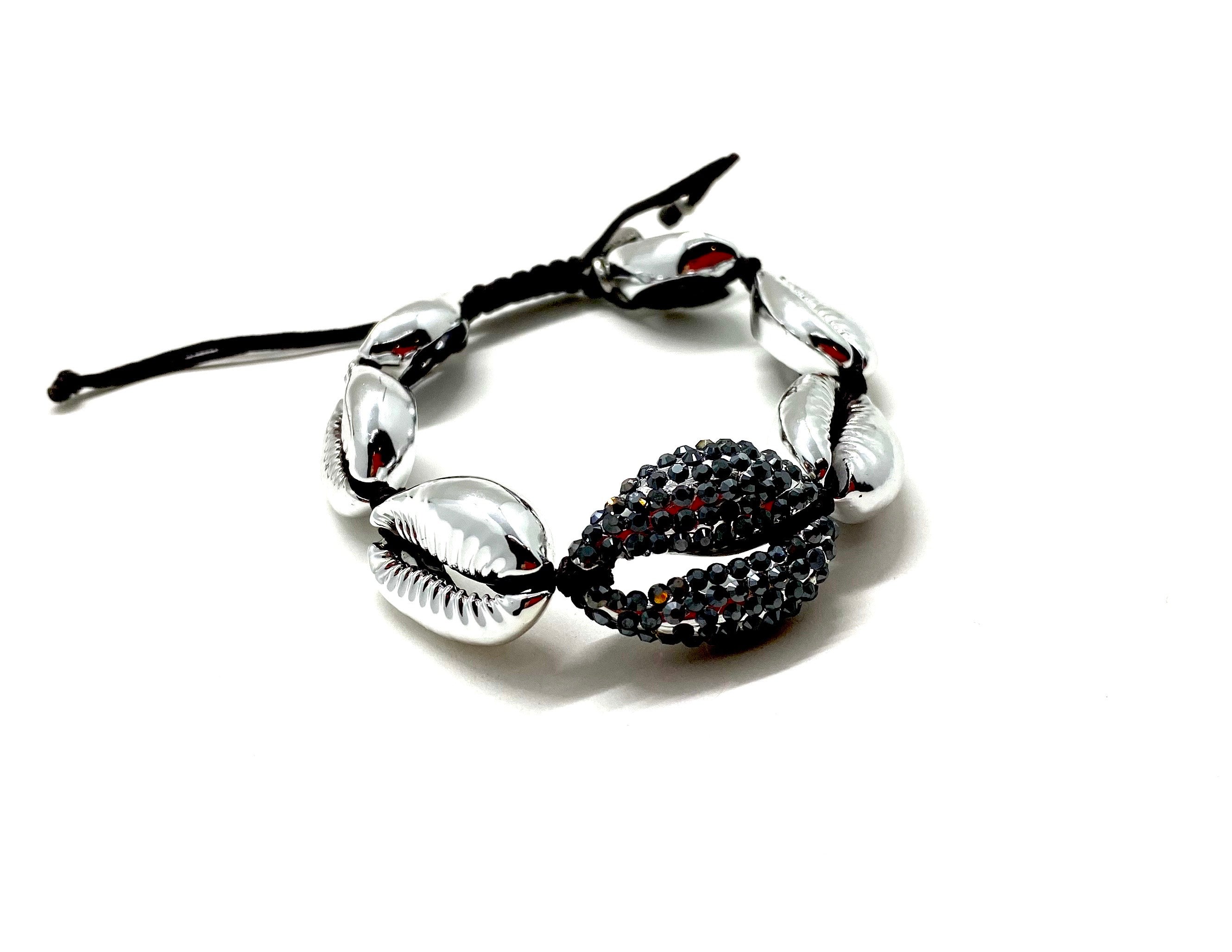 Silver shell bracelet, with hematite Swarovski studded central shell, and black cord