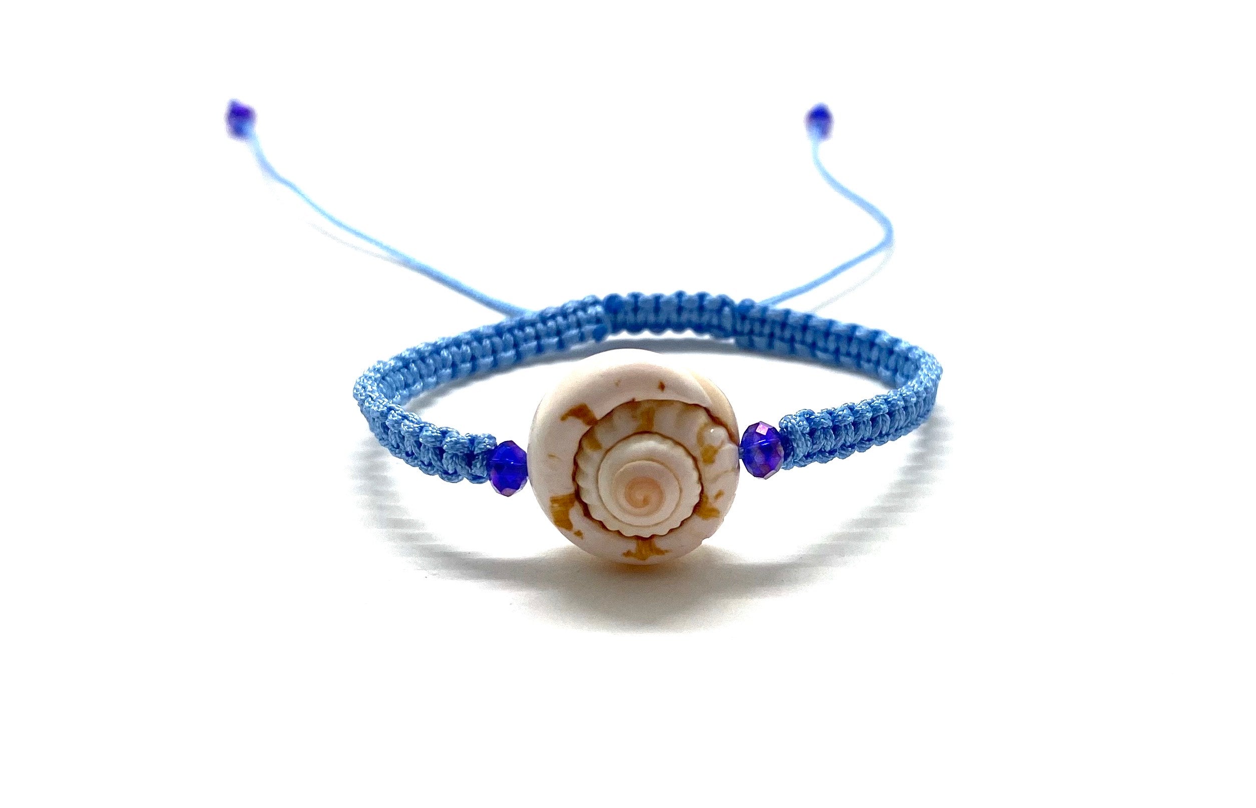 Seashell bracelet, purple Swarovski beads baby blue braided cord