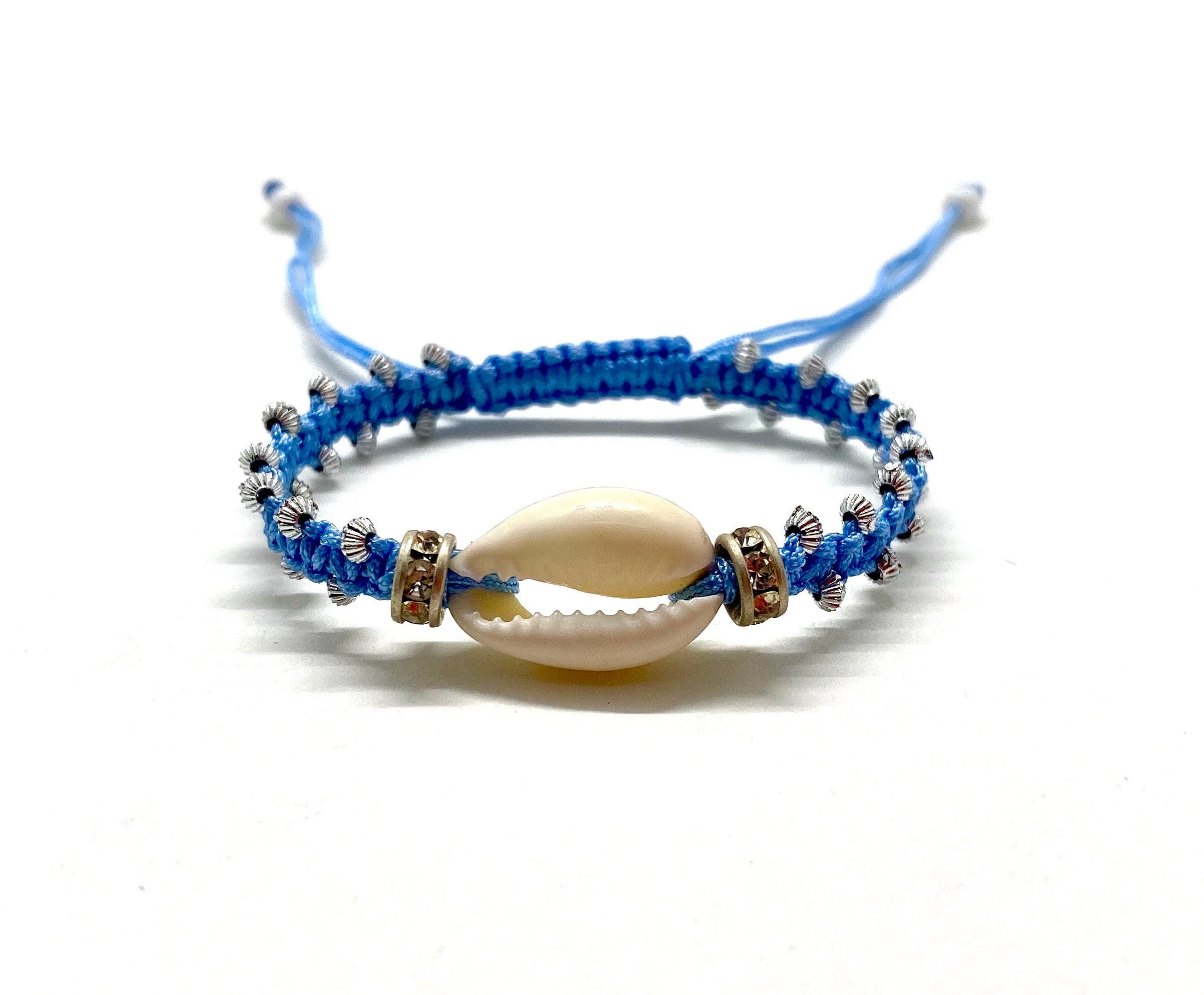 Natural shell bracelet, baby blue cord and gold toupee