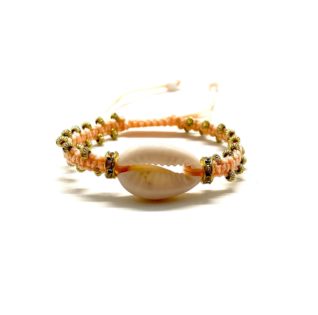 Natural shell bracelet pastel peach cord, gold toupee