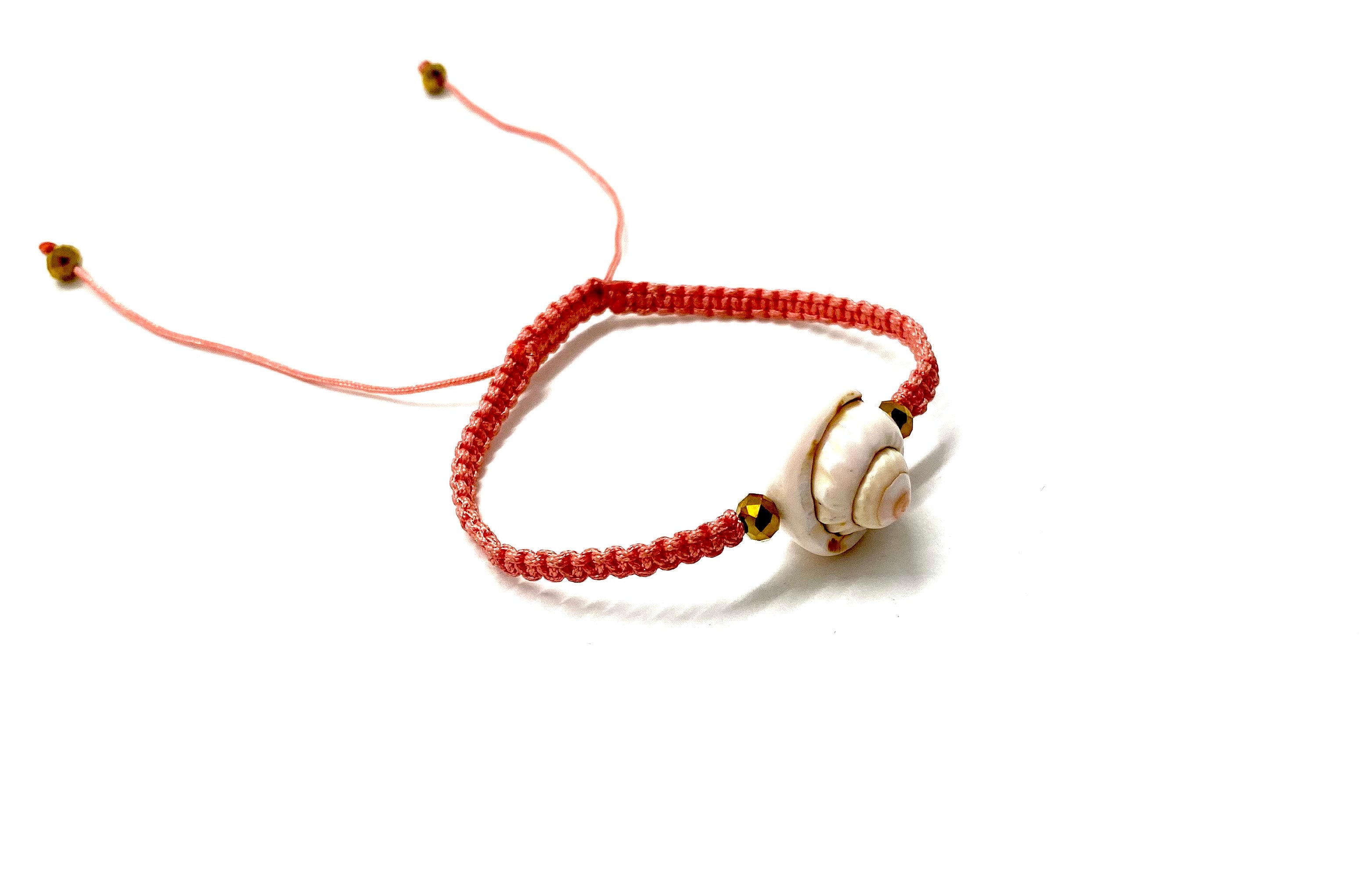 Sea shell bracelet with gold Swarovski bead and salmon cord