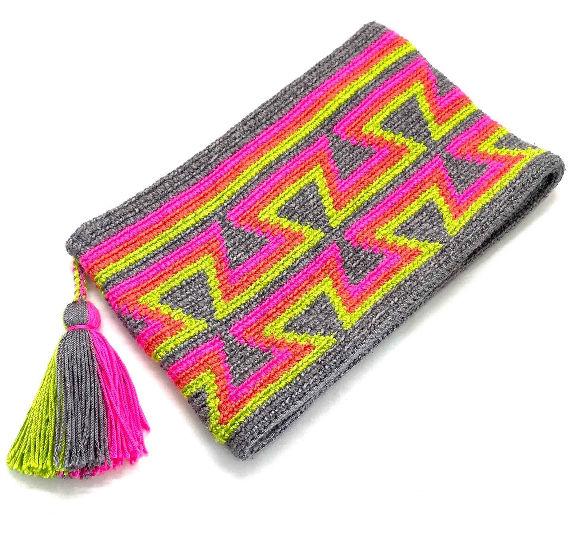 Clutch with grey body, grey inverted triangles, fluo pink, orange, and tassel.