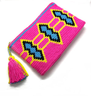 fluo pink body clutch, blue, black, and yellow standing diamond pattern with tassel.
