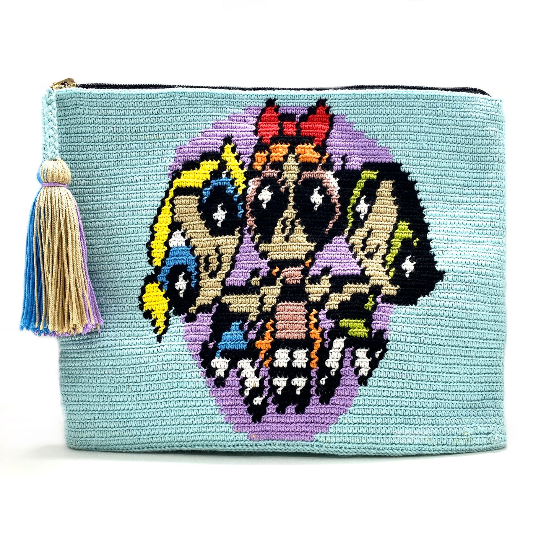 Power puff clutch, lavender circle, sky blue body with tassel.