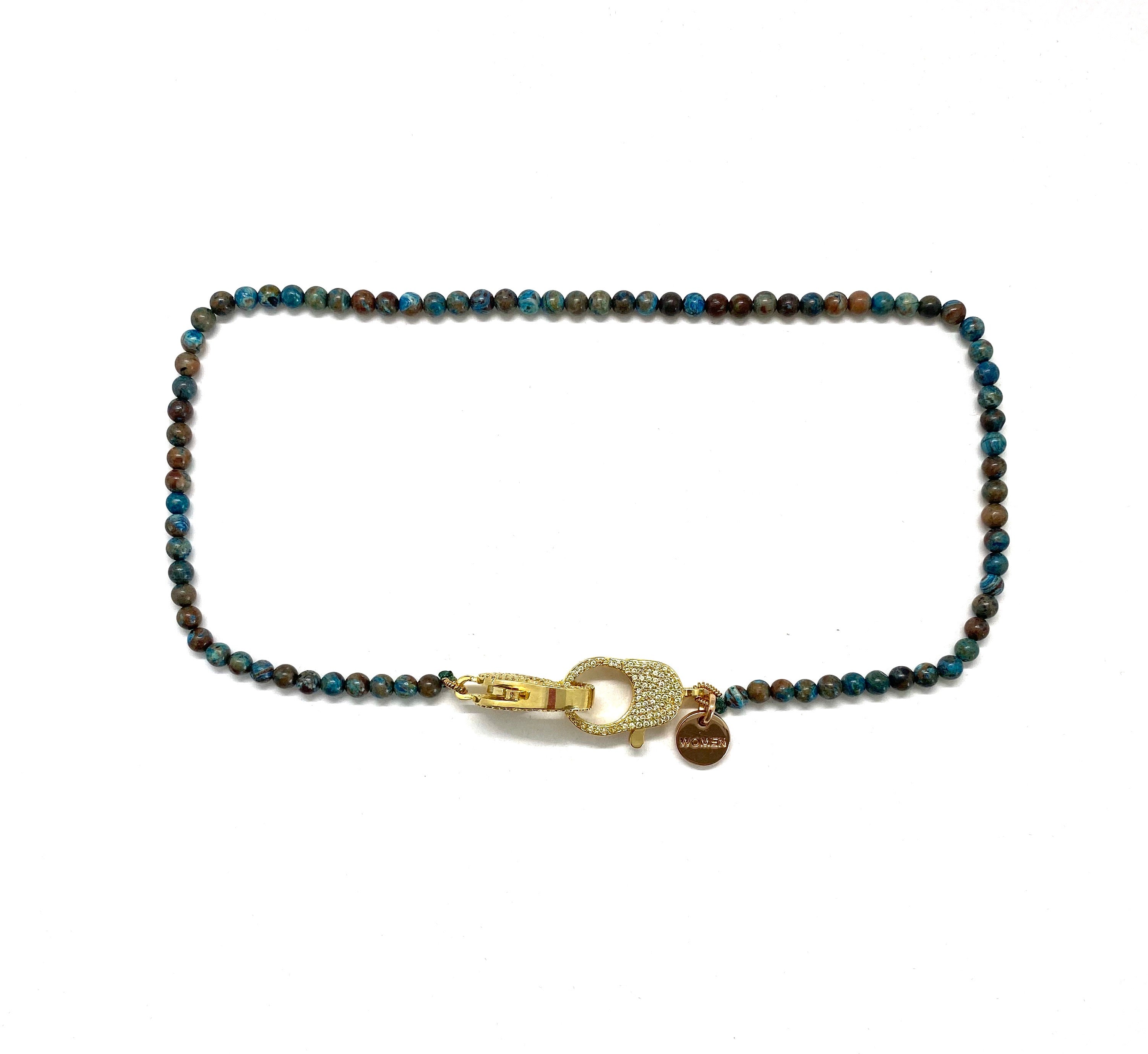 Clip to impact, Blue crazy lace agate Christine necklace, with gold zirconia clips.