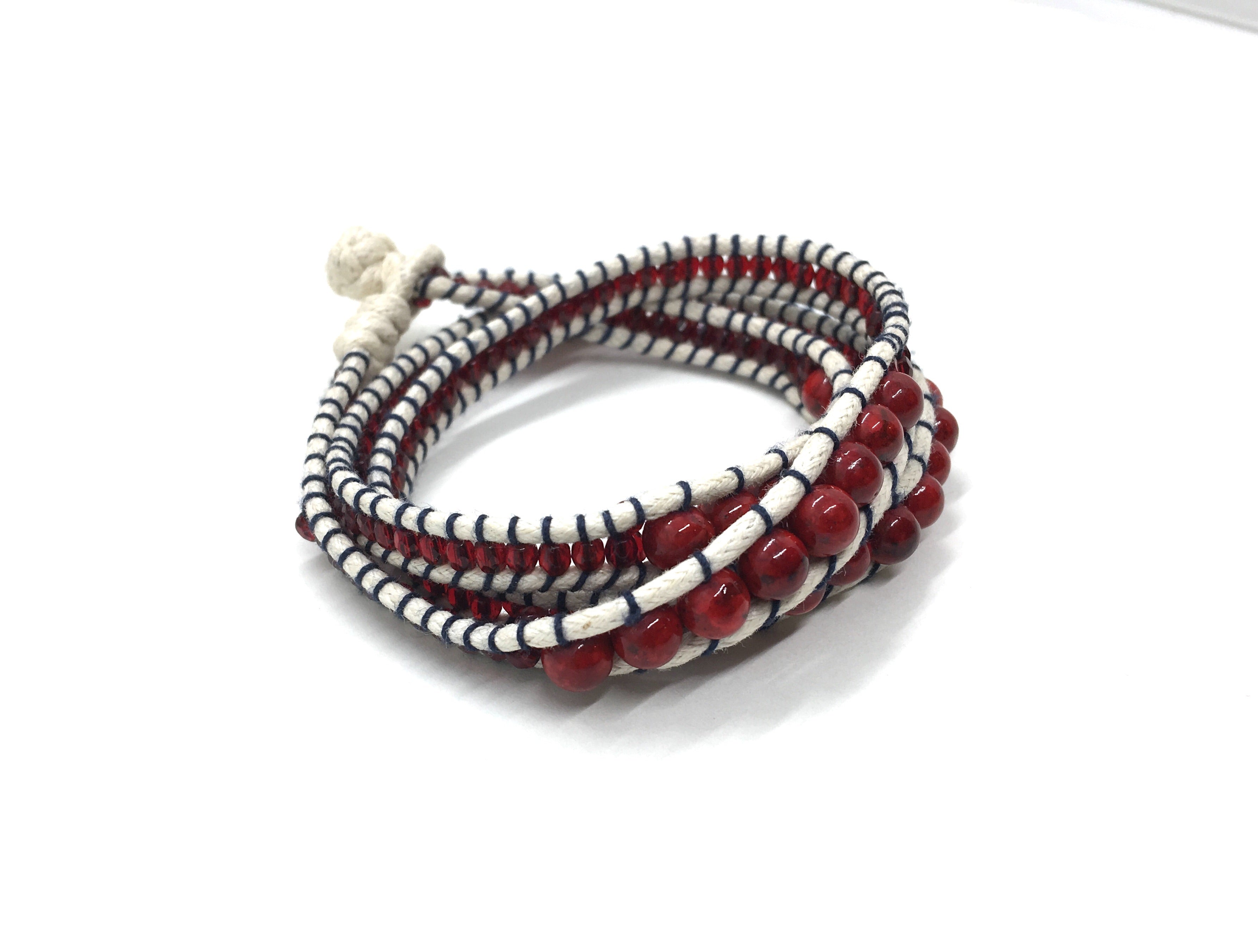 Wraparound bracelet dark coral stone.