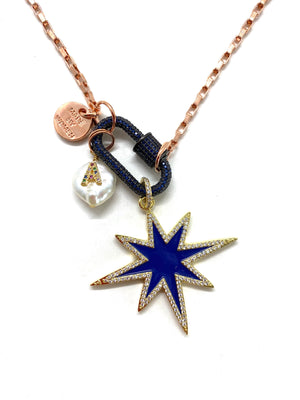 Rose gold chain, dark blue studded clip and blue star