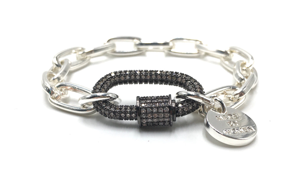 Clip to Impact Silver hardware bracelet with black zirconia clip.