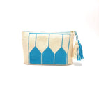 Clutch, off white body, blue temple pattern with tassel.