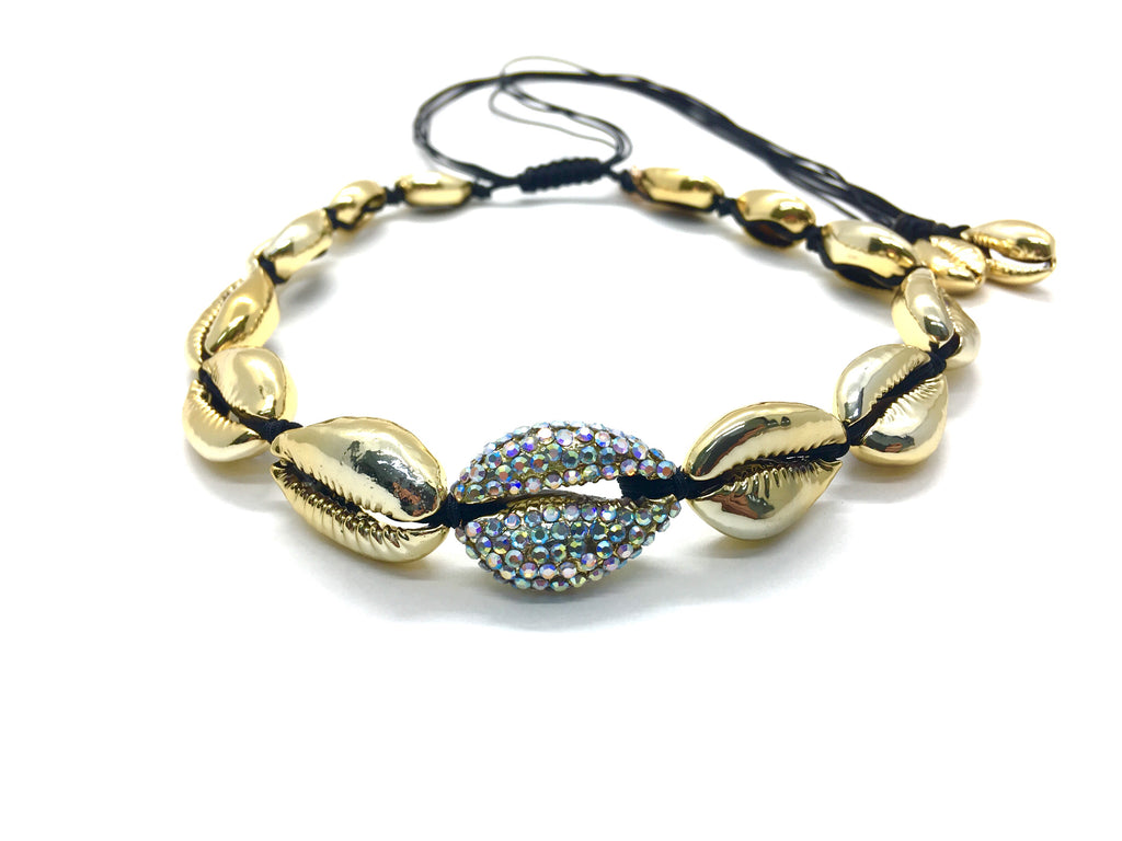 Gold shell necklace, with Swarovski studded central shell, and black cord