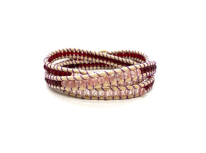 Wraparound rose quartz bracelet with vintage blood red Swarovski side crystal beads.
