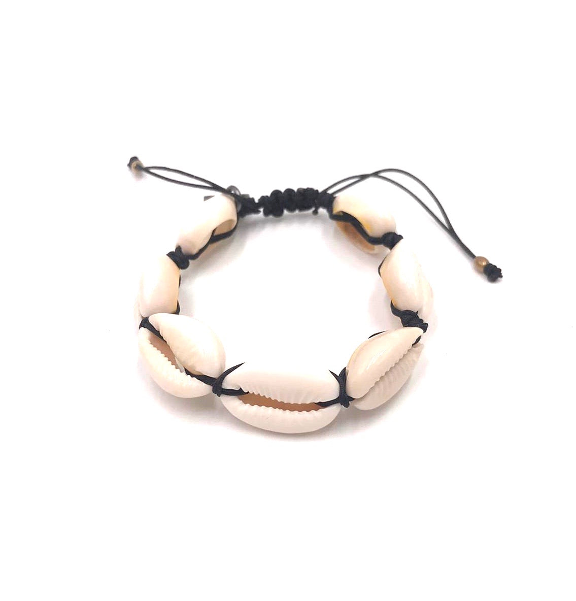 Natural shell bracelet with black cord.