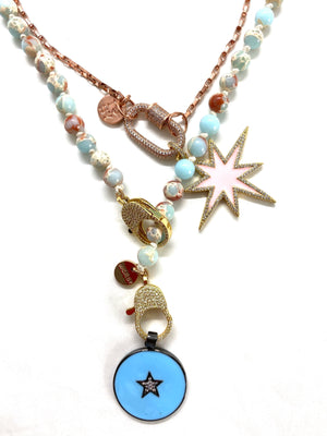 Aqua Gaia necklace, with round blue star pendant, gold zirconia clips