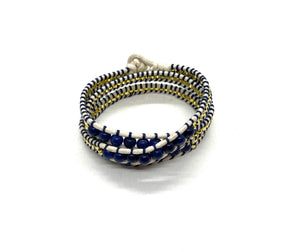 Wraparound dark blue beads bracelet, beige cord and gold resin side bead: