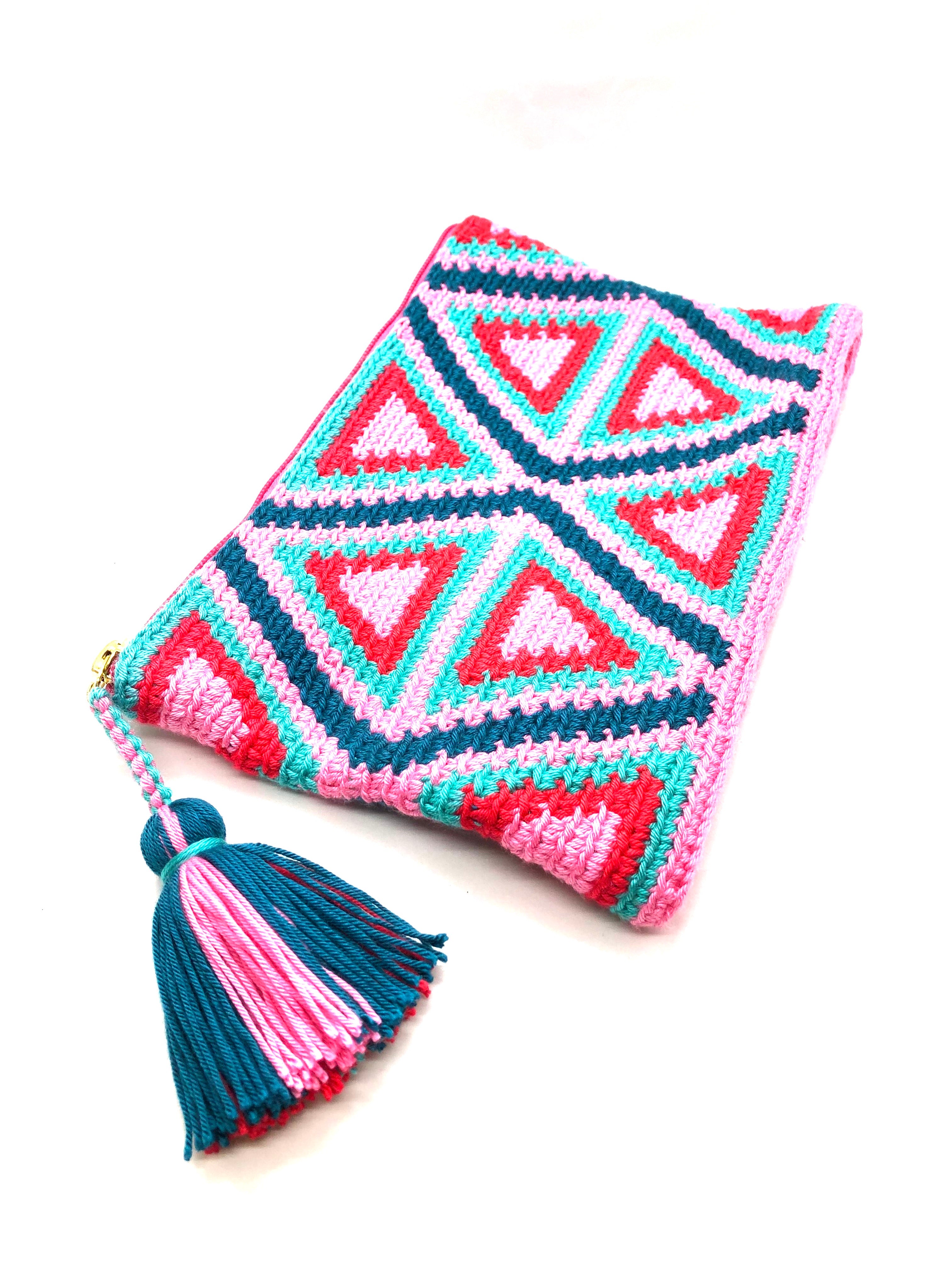 Clutch, with red, pink, turquoise and petrol triangle pattern with tassel.