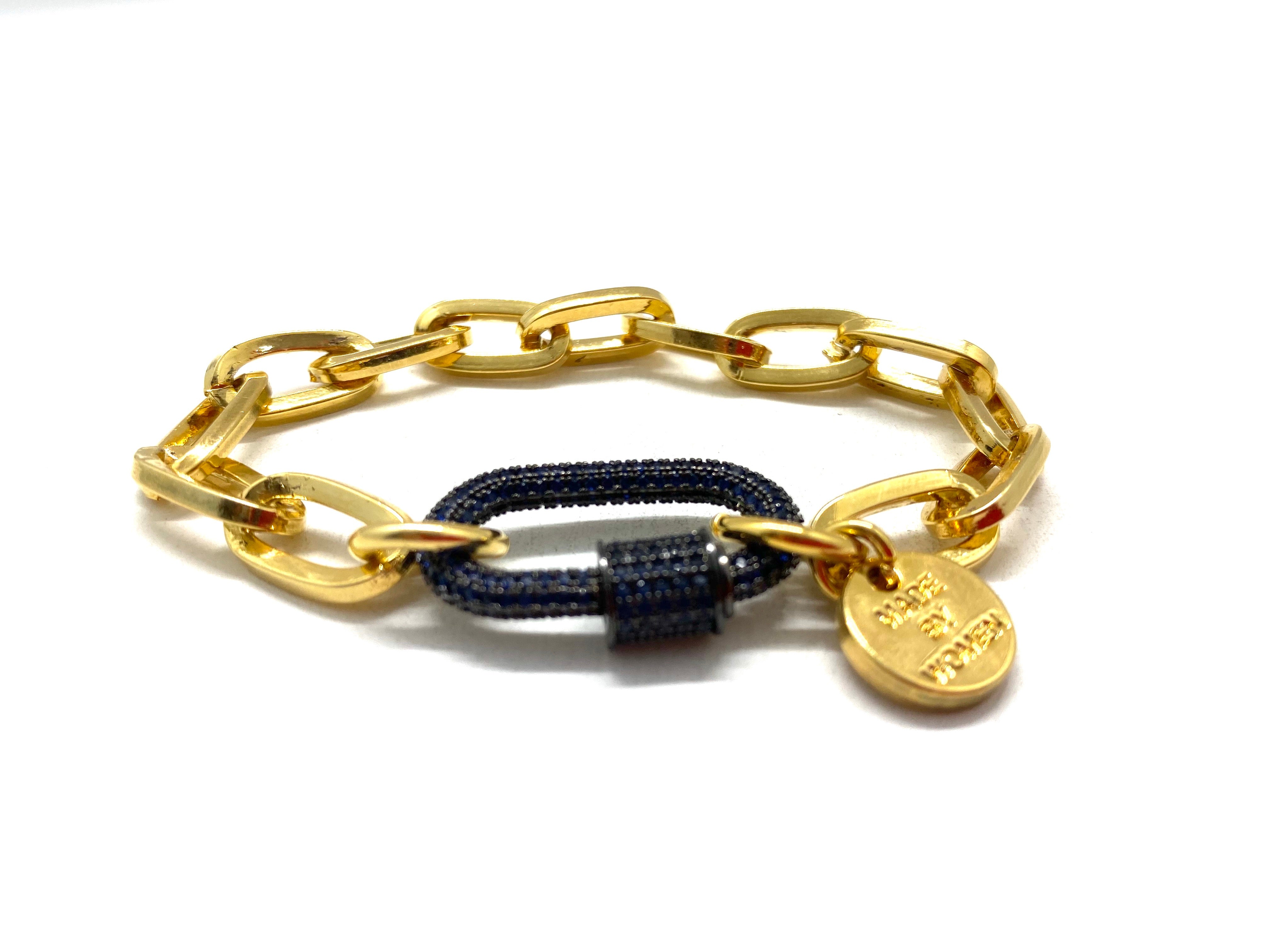 Gold chain dark blue zirconia studded hardware link.