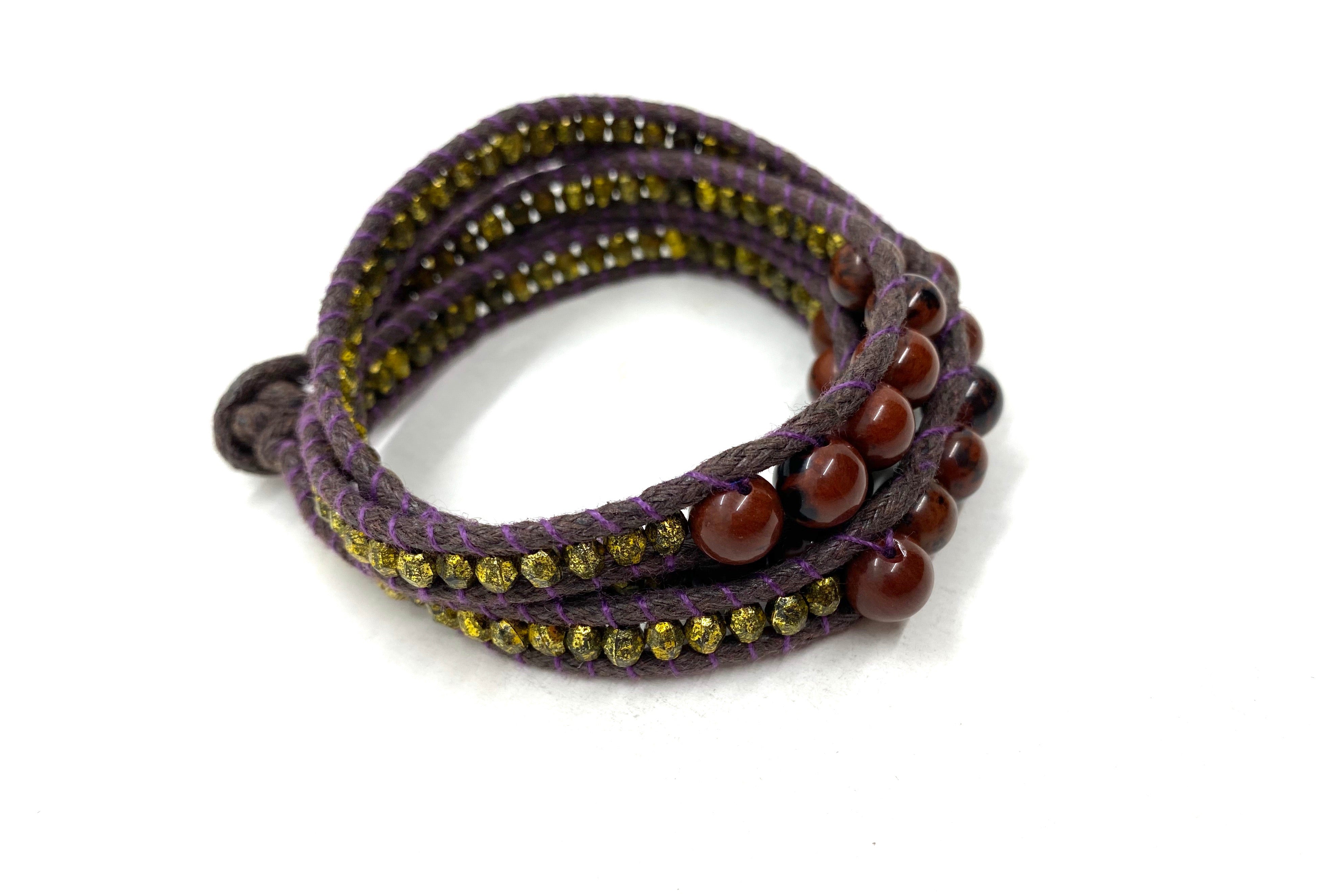 Wraparound brown bead bracelet, dark brown cord pale gold resin side bead.