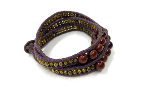 Wraparound brown bead bracelet, dark brown cord pale gold resin side bead.