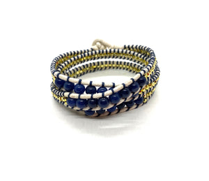 Wraparound dark blue beads bracelet, beige cord and gold resin side bead: