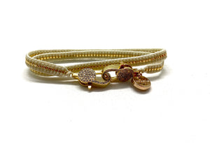 Cream miyuki bracelet, gold sequence and clips