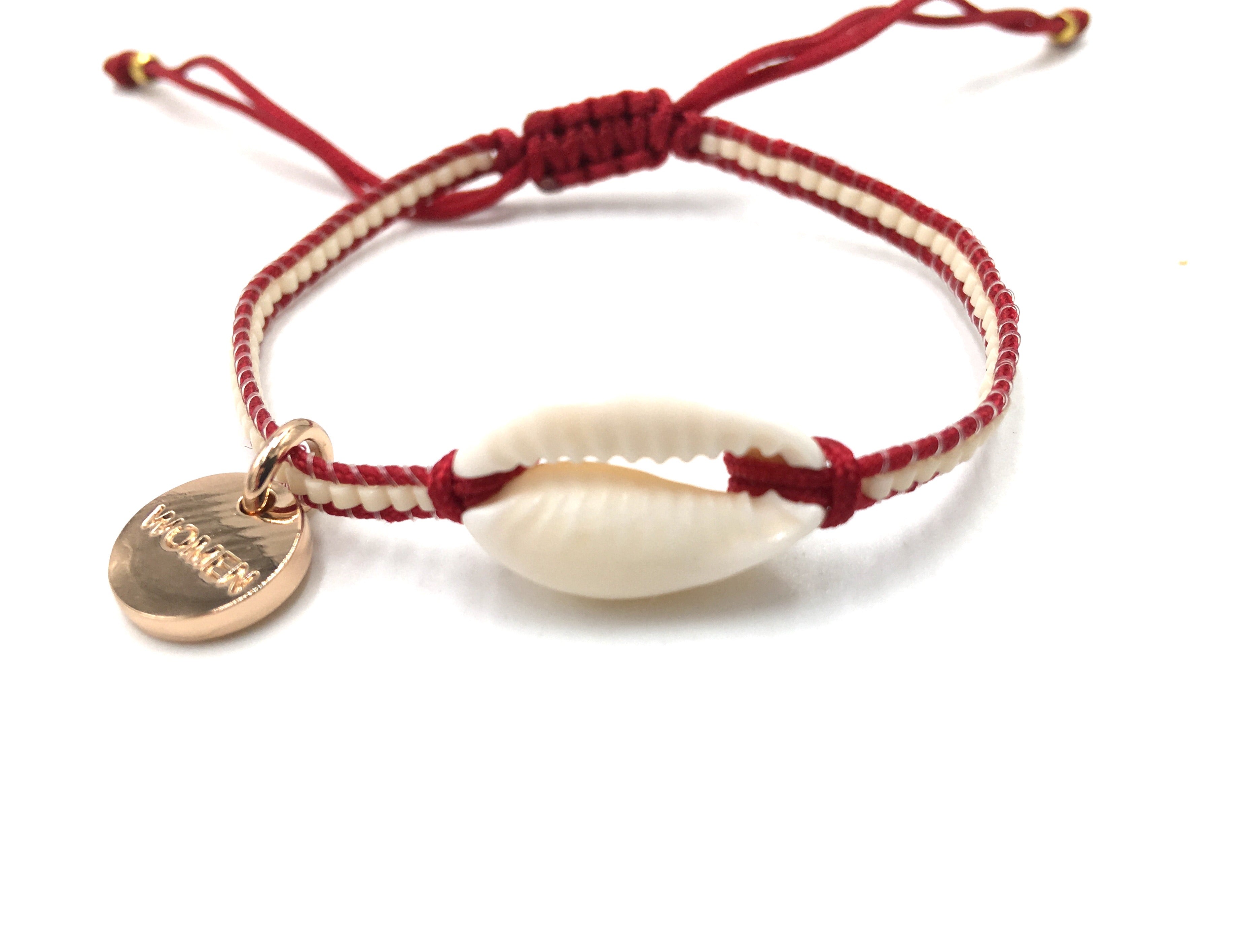 Natural shell bracelet, cream mIyuki and dark red cord.