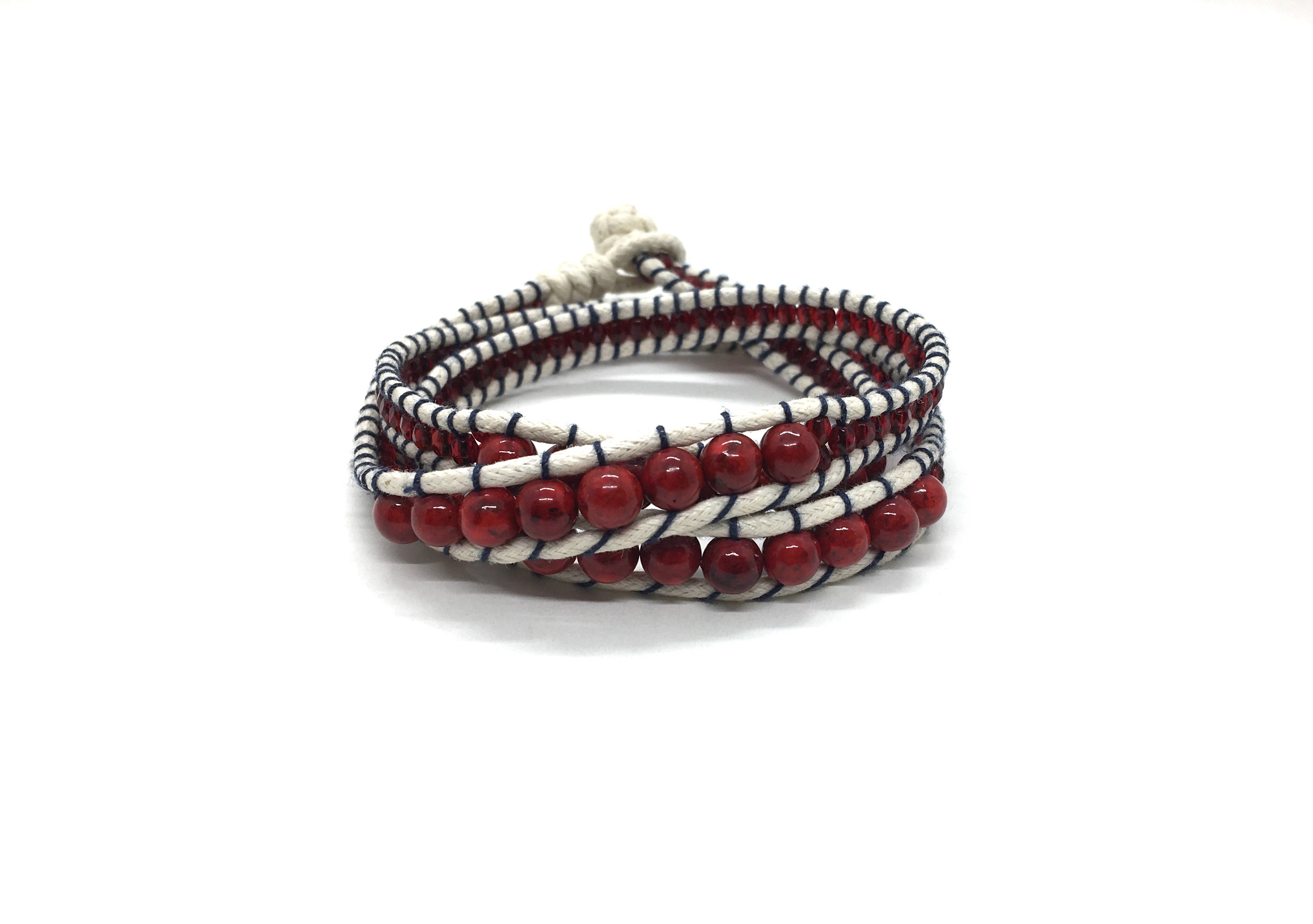 Wraparound bracelet dark coral stone.