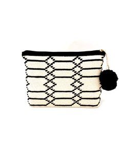 Clutch, Off white body, black sequence geometric pattern with pompom.