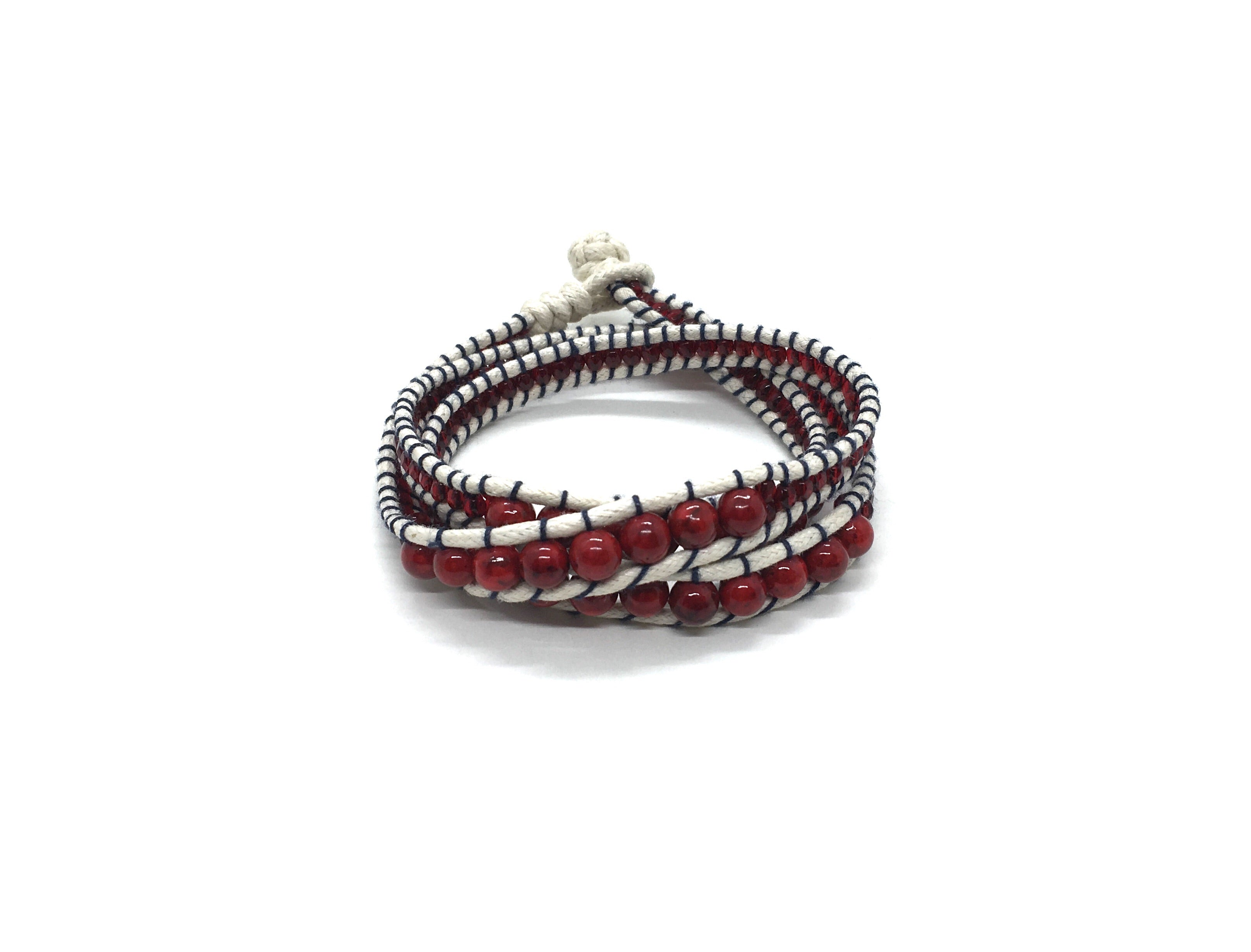Wraparound bracelet dark coral stone.