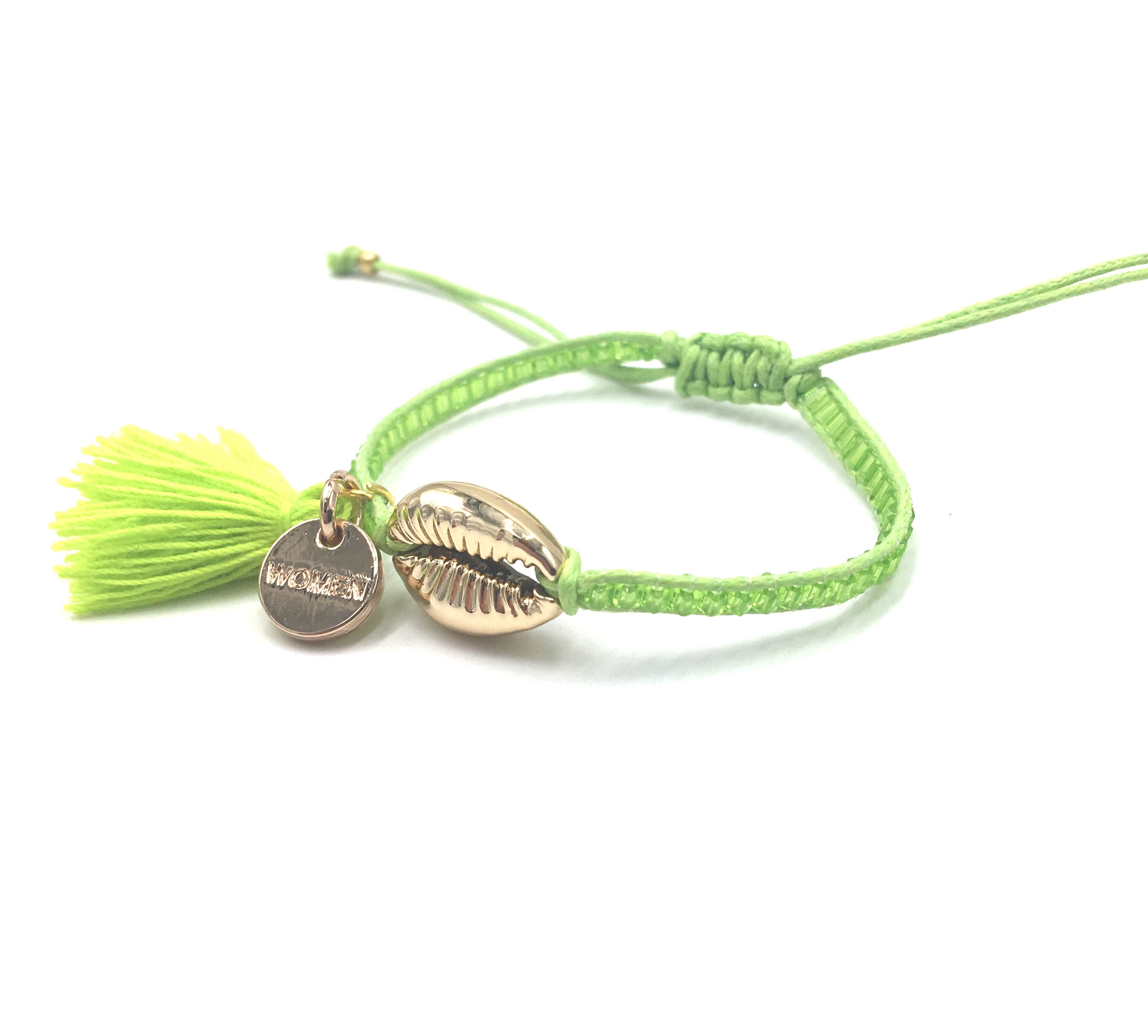 Gold Shell bracelet, kiwi green beads and tassel.