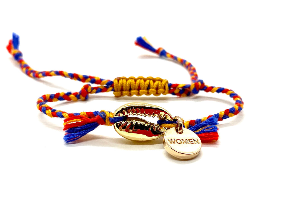 Gold shell bracelet, ‘cotton perlé’ with mustard, blue and red braided cord