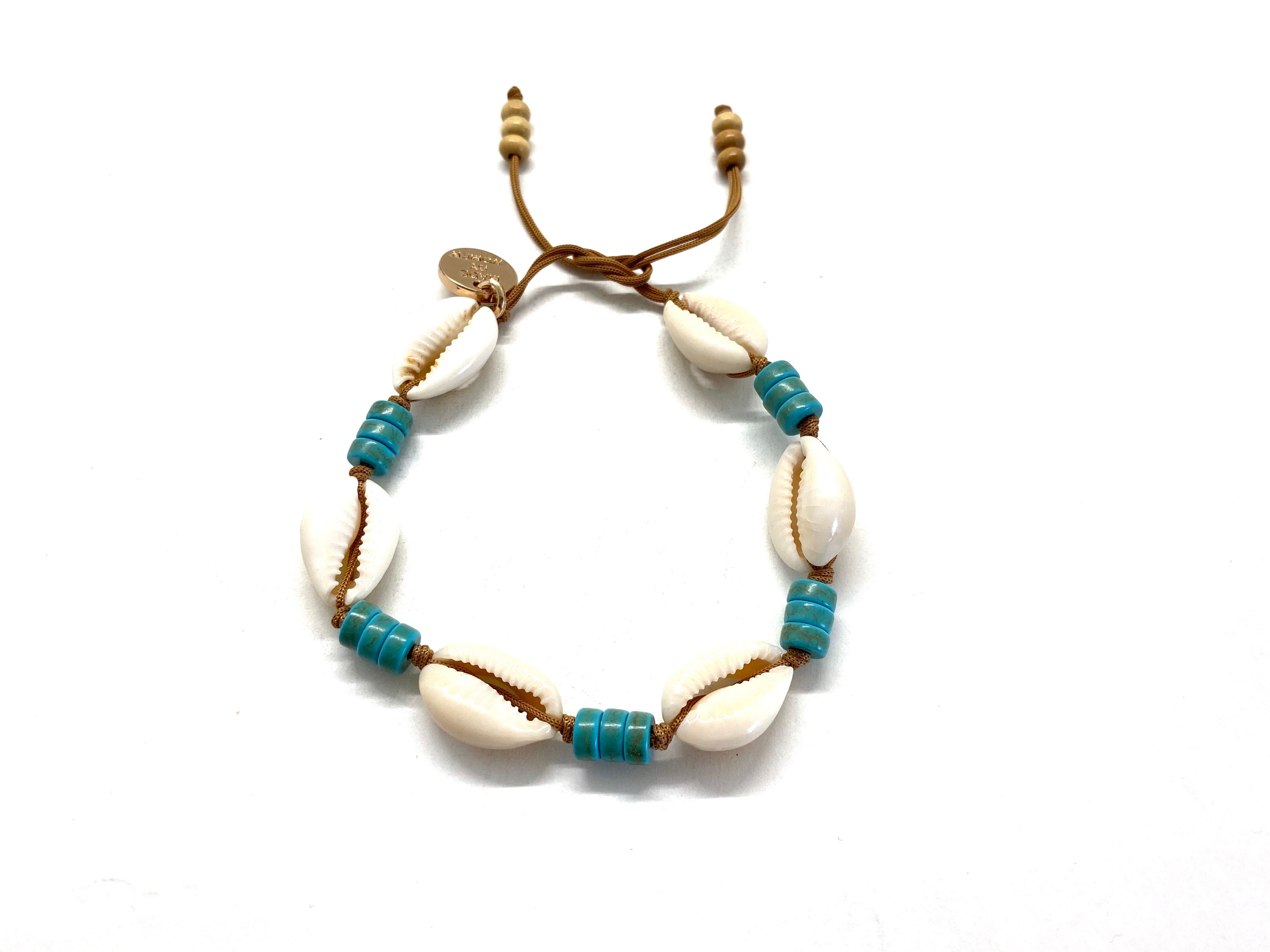 Natural shell anklet with ‘rondelle’.