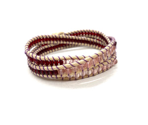 Wraparound rose quartz bracelet with vintage blood red Swarovski side crystal beads.