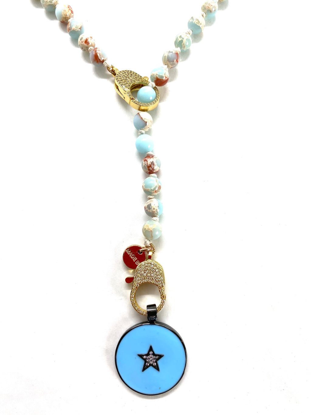 Aqua Gaia necklace, with round blue star pendant, gold zirconia clips