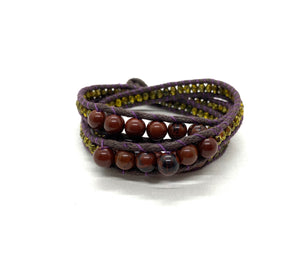 Wraparound brown bead bracelet, dark brown cord pale gold resin side bead.