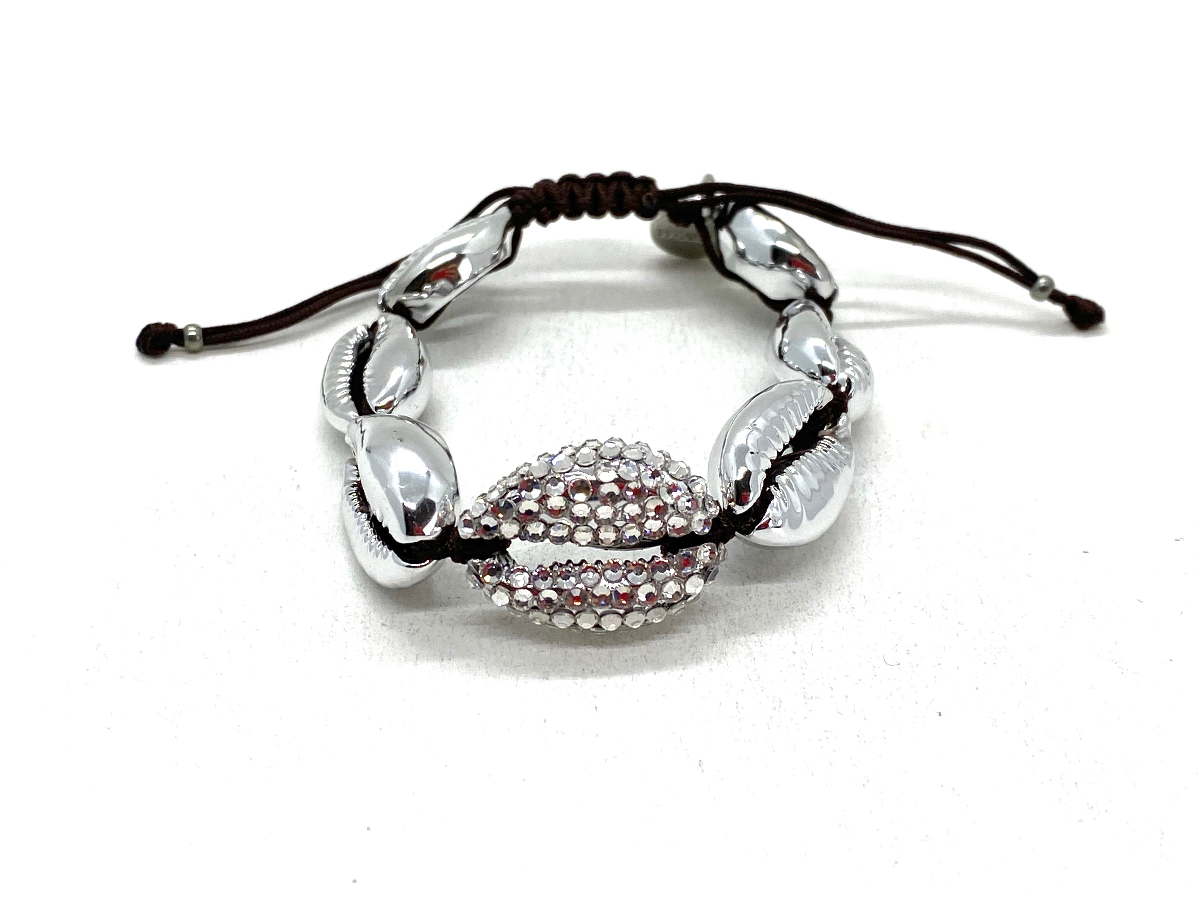 Silver shell bracelet, central piece studded.