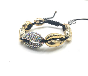 Gold shell bracelet, with Swarovski studded central shell, and black cord