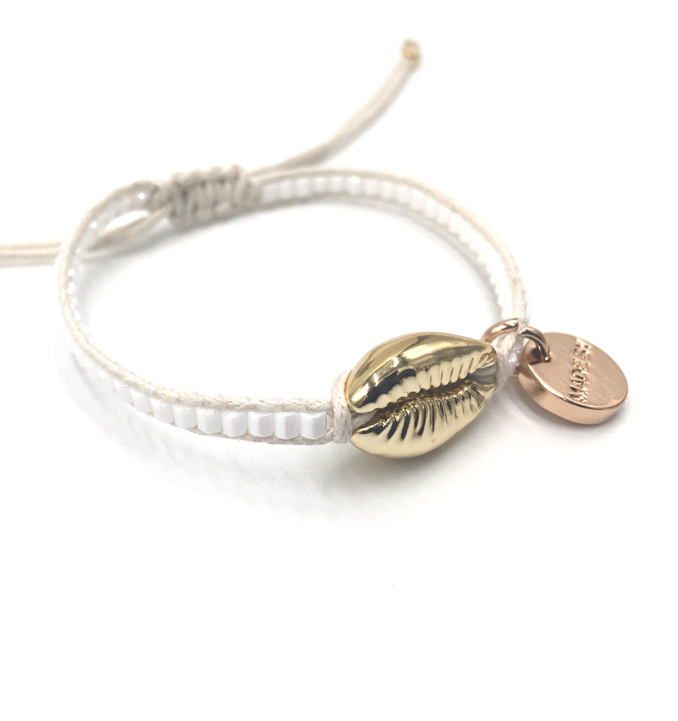 Gold Shell bracelet, white seed beads, offwhite cord