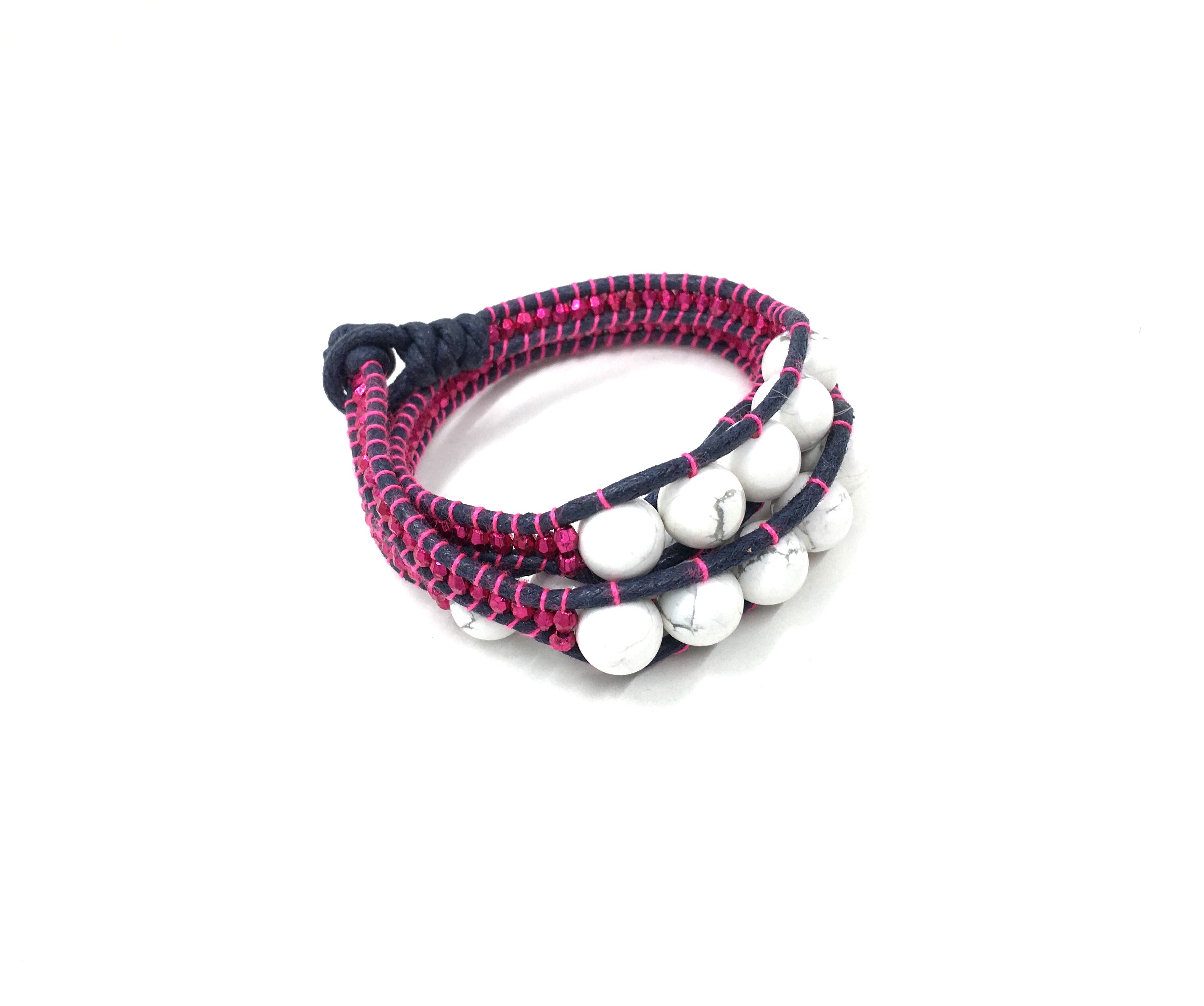 Wraparound bracelet howlite marbled stone, fuchsia resin side bead, petrol cord fuchsia thread.