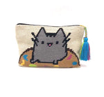 Fat cat in donut clutch, with tassel.