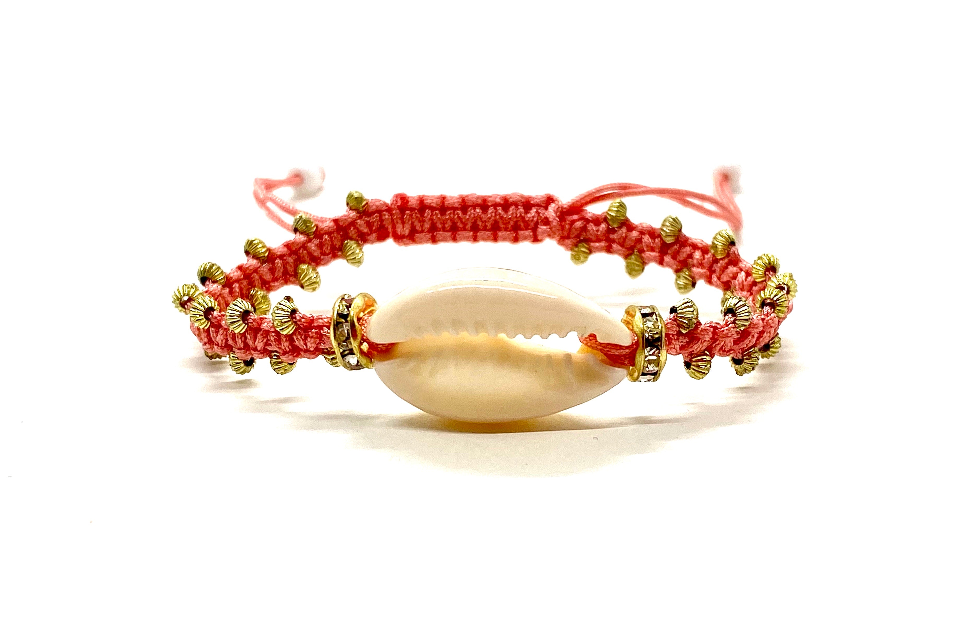 Natural shell bracelet with coral cord and gold resin beads.
